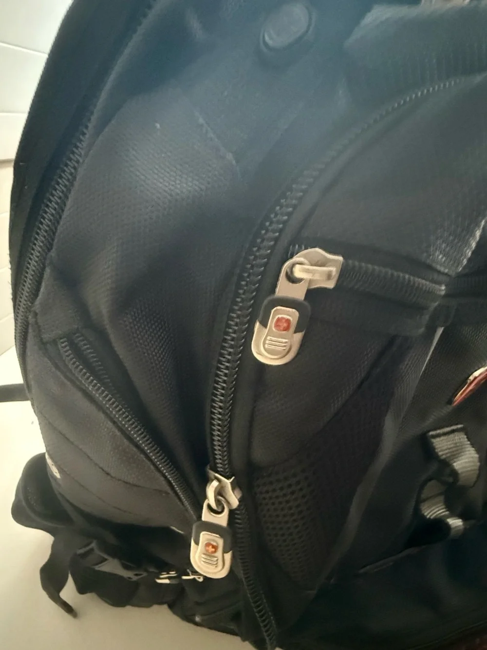 Swiss Gear Black Men’s Travel Backpack with Red Cross Accent